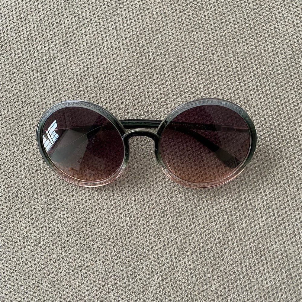 Green and pink round sunglasses